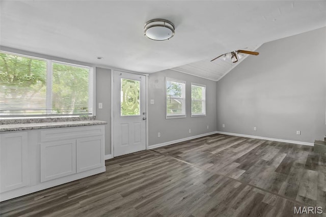 2826 Dawnview Dr, Florissant, MO 63031 - unfurnished living room with dark wood-type flooring, ceiling fan, and lofted ceiling