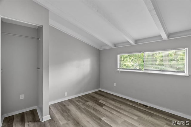 2826 Dawnview Dr, Florissant, MO 63031 - unfurnished bedroom featuring wood finished floors and baseboards