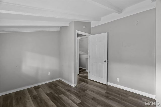 2826 Dawnview Dr, Florissant, MO 63031 - unfurnished room featuring beam ceiling and dark wood-type flooring