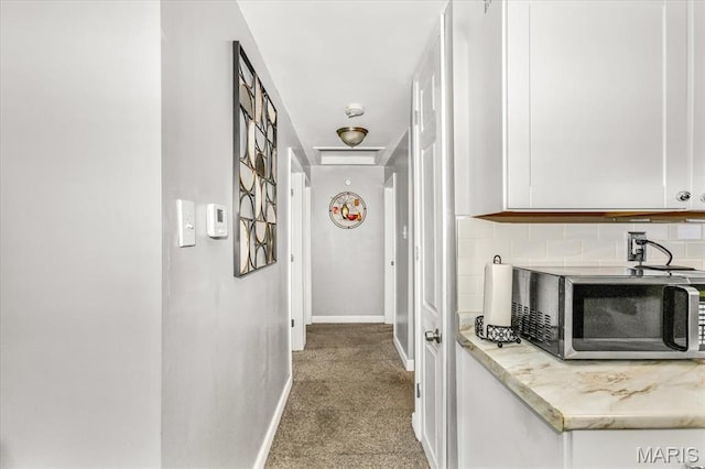 8400 Chalons Ct, Berkeley, MO 63134 - hallway with carpet and baseboards
