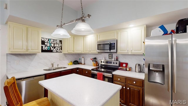515 E S Ave, Greenville, IL 62246 - kitchen featuring appliances with stainless steel finishes, light countertops, decorative backsplash, a center island, and vaulted ceiling