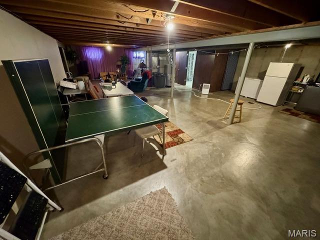 8 E 11th St, Washington, MO 63090 - finished basement with freestanding refrigerator
