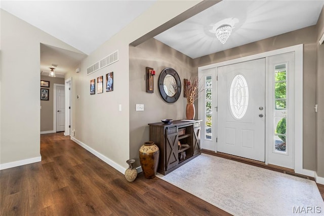 600 Emerald Meadows Ct, Saint Charles, MO 63304 - entryway featuring healthy amount of natural light, wood finished floors, vaulted ceiling, and a chandelier