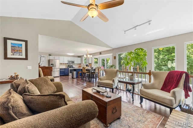 600 Emerald Meadows Ct, Saint Charles, MO 63304 - living room with rail lighting, lofted ceiling, wood finished floors, a chandelier, and a ceiling fan