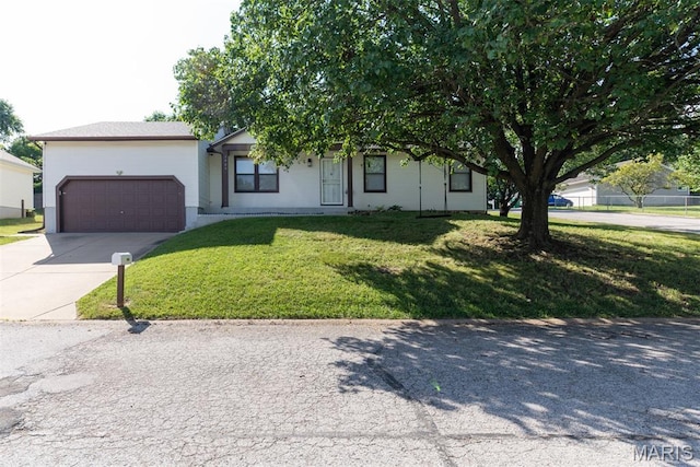 1409 Castle Mill Dr, Arnold, MO 63010 - view of front of property featuring a garage, driveway, and a front yard