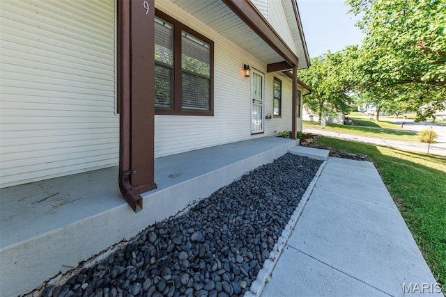 1409 Castle Mill Dr, Arnold, MO 63010 - view of side of home with covered porch