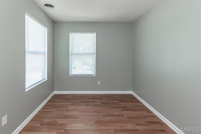 1409 Castle Mill Dr, Arnold, MO 63010 - unfurnished room with wood finished floors and baseboards
