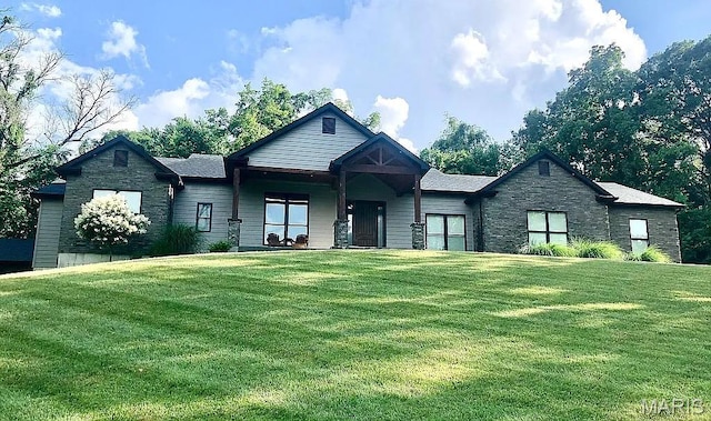 1106 Palmer Pl, Imperial, MO 63052 - view of front of property with stone siding and a front yard