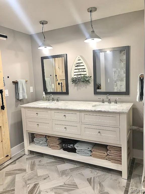 1106 Palmer Pl, Imperial, MO 63052 - full bath featuring double vanity and baseboards