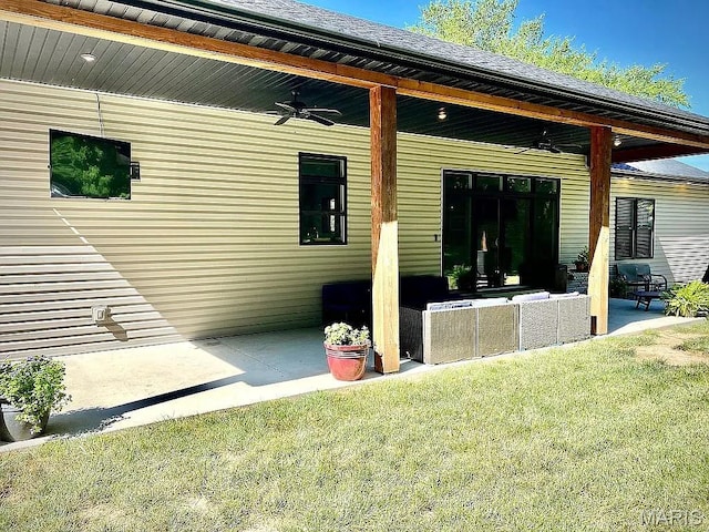 1106 Palmer Pl, Imperial, MO 63052 - rear view of property with ceiling fan, a patio, outdoor lounge area, and a lawn