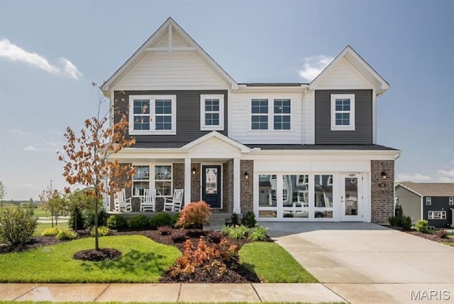 106 Cardow Dr, Ofallon, MO 63368 - craftsman inspired home featuring brick siding and a porch
