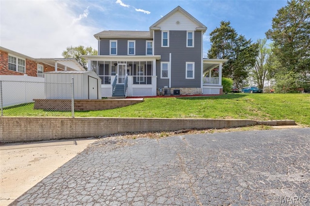 712 Maple St, Hillsboro, MO 63050 - view of front of property with a sunroom and a shed