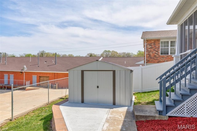 712 Maple St, Hillsboro, MO 63050 - view of shed with a fenced backyard and stairs