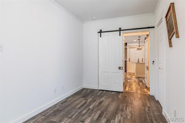 712 Maple St, Hillsboro, MO 63050 - unfurnished room featuring a barn door, dark wood-style floors, and crown molding