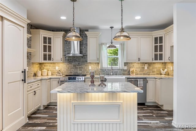 712 Maple St, Hillsboro, MO 63050 - kitchen featuring stainless steel appliances, dark wood finished floors, decorative backsplash, glass insert cabinets, and pendant lighting