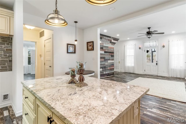 712 Maple St, Hillsboro, MO 63050 - kitchen featuring cream cabinetry, dark wood-type flooring, recessed lighting, light stone countertops, and a ceiling fan