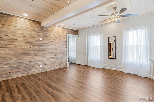 712 Maple St, Hillsboro, MO 63050 - spare room with a wood ceiling with exposed beams, a ceiling fan, wood finished floors, wooden walls, and recessed lighting