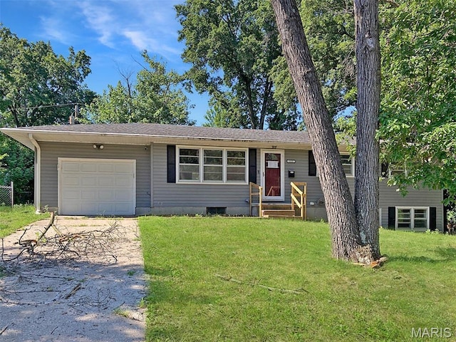 112 W Thurman St, Columbia, MO 65202 - ranch-style home with concrete driveway, a front lawn, and an attached garage