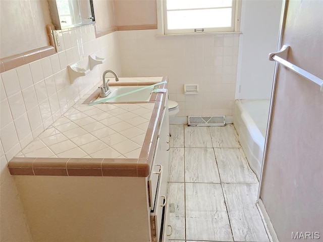 112 W Thurman St, Columbia, MO 65202 - bathroom with vanity, a bath, and a shower