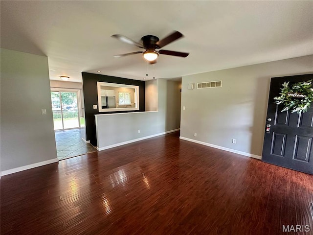 7 Oxbow Rd, Saint Peters, MO 63376 - unfurnished living room featuring a ceiling fan and wood finished floors