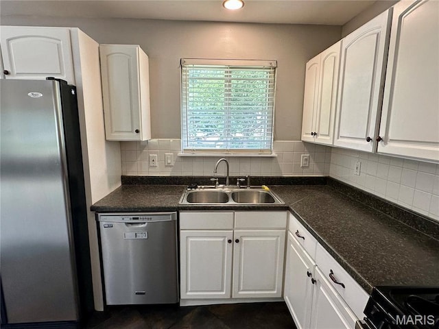 7 Oxbow Rd, Saint Peters, MO 63376 - kitchen featuring stainless steel appliances, white cabinetry, dark countertops, tasteful backsplash, and recessed lighting