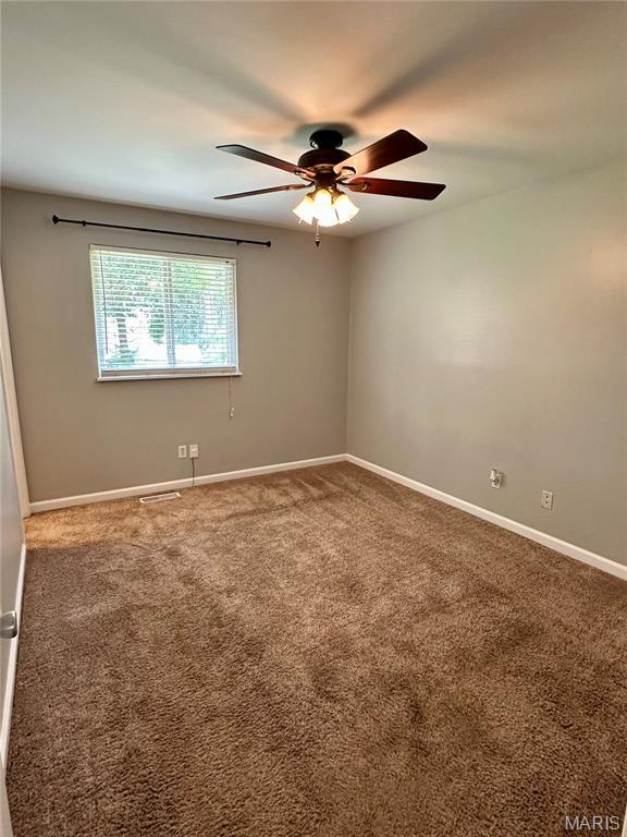 7 Oxbow Rd, Saint Peters, MO 63376 - unfurnished room featuring ceiling fan and carpet floors