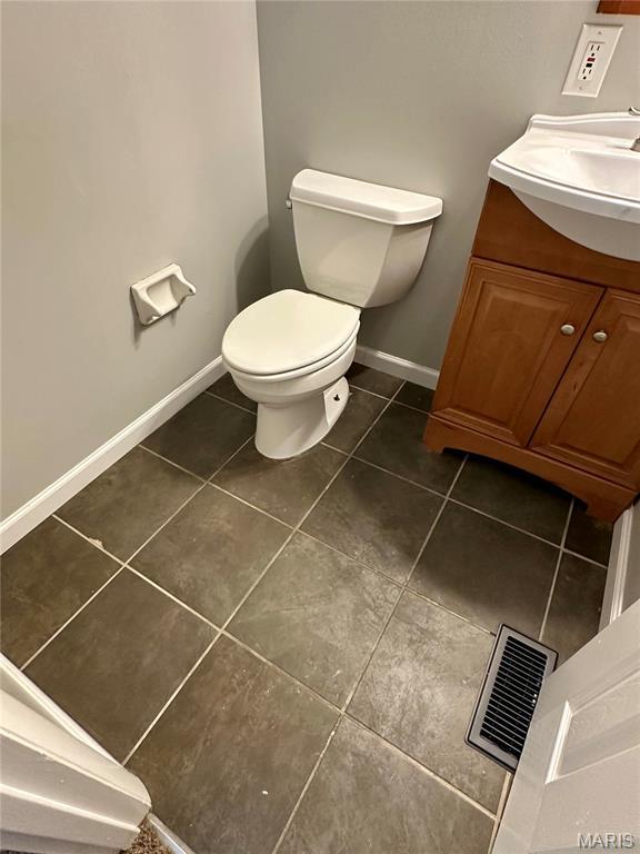 7 Oxbow Rd, Saint Peters, MO 63376 - half bathroom with tile patterned flooring and vanity