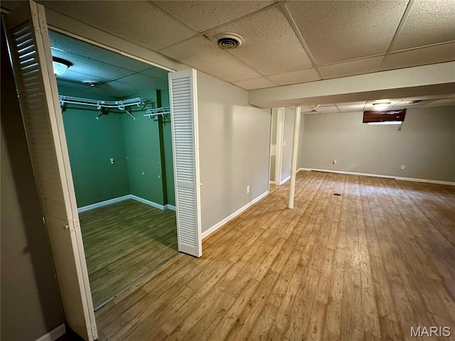 7 Oxbow Rd, Saint Peters, MO 63376 - finished below grade area with wood finished floors and a paneled ceiling