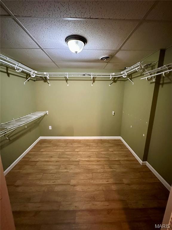 7 Oxbow Rd, Saint Peters, MO 63376 - walk in closet with wood finished floors and a drop ceiling