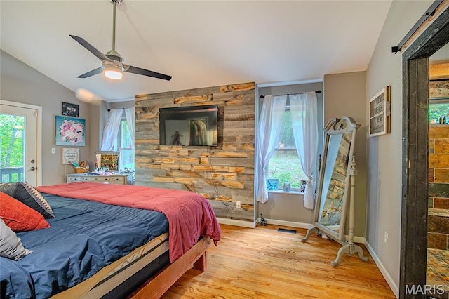 532 Fairfield Valley Rd, Pacific, MO 63069 - bedroom with vaulted ceiling, multiple windows, wood finished floors, ceiling fan, and access to outside