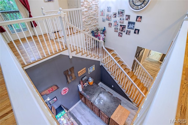 532 Fairfield Valley Rd, Pacific, MO 63069 - stairs with wood finished floors