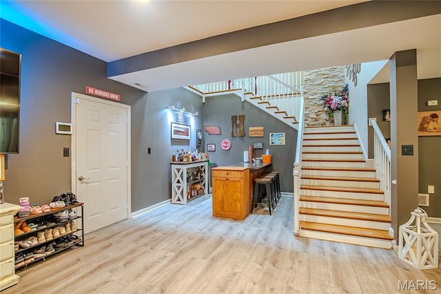 532 Fairfield Valley Rd, Pacific, MO 63069 - bar featuring light wood-type flooring and stairs