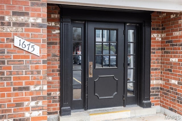 1675 Blue Ridge Dr Unit B, Lemay Township, MO 63125 - view of exterior entry featuring brick siding
