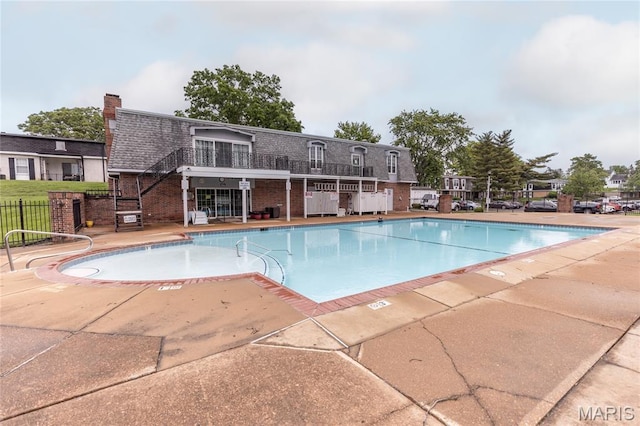1675 Blue Ridge Dr Unit B, Lemay Township, MO 63125 - community pool with a patio and stairs