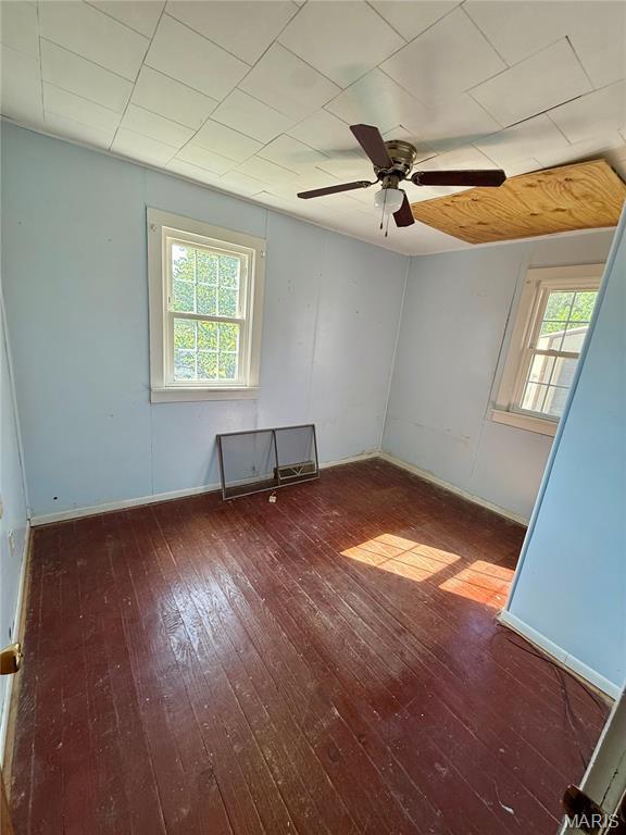 504 Wolfe St, Potosi, MO 63664 - unfurnished room with wood-type flooring and ceiling fan