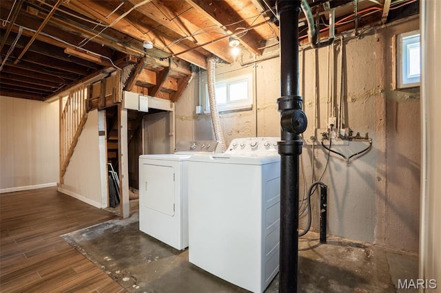 346 Madison Ave, Saint Louis, MO 63119 - basement with independent washer and dryer, stairway, and wood finished floors