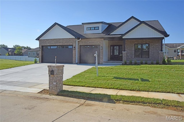 8748 Wendell Creek Dr, Saint Jacob, IL 62281 - view of front of home featuring brick siding, an attached garage, driveway, and a shingled roof