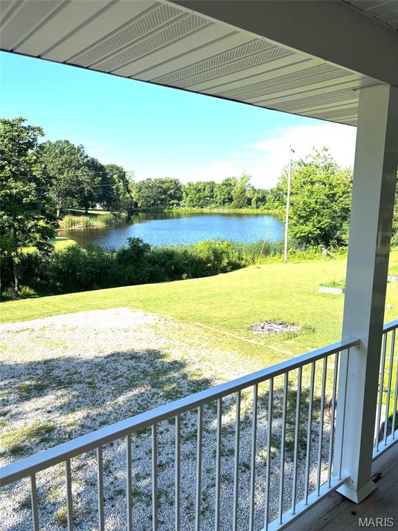 14875 County Road 2310, St James, MO 65559 - water view with a tree filled landscape