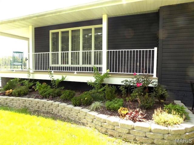 14875 County Road 2310, St James, MO 65559 - view of side of home featuring covered porch