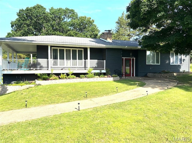 14875 County Road 2310, St James, MO 65559 - view of front of home with covered porch, a front lawn, and a chimney