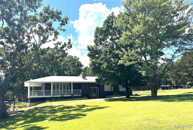 14875 County Road 2310, St James, MO 65559 - view of front facade featuring a front yard and a chimney