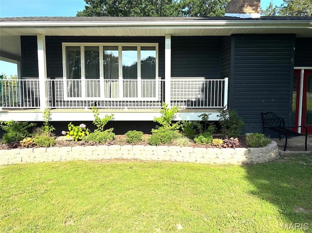 14875 County Road 2310, St James, MO 65559 - rear view of house featuring a porch, a yard, and a chimney