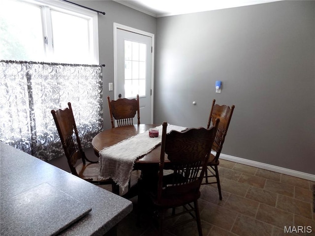 14875 County Road 2310, St James, MO 65559 - dining room featuring baseboards
