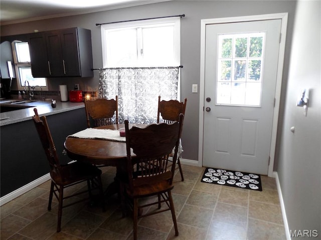 14875 County Road 2310, St James, MO 65559 - dining space with baseboards and crown molding