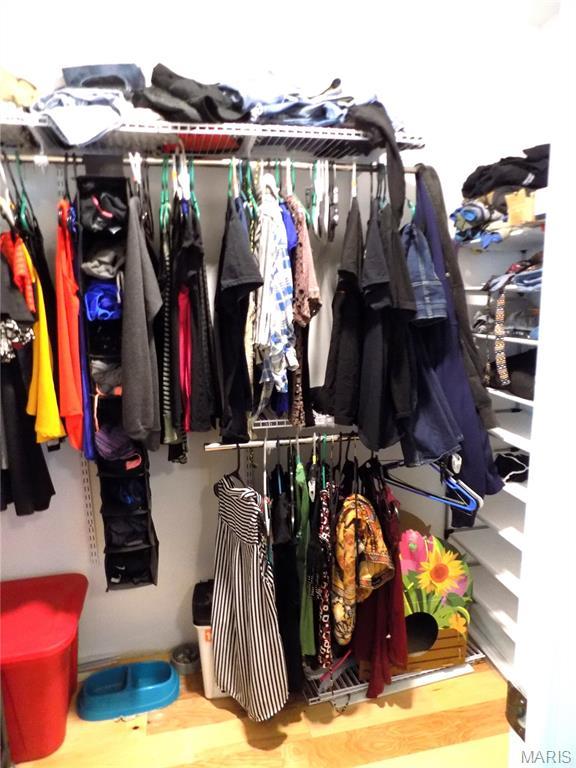 14875 County Road 2310, St James, MO 65559 - walk in closet with wood finished floors