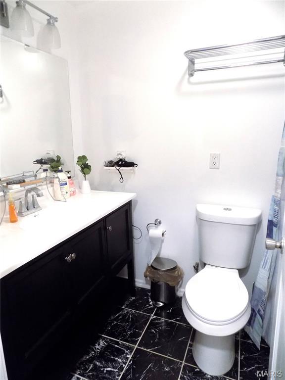 14875 County Road 2310, St James, MO 65559 - full bath with marble finish flooring and vanity