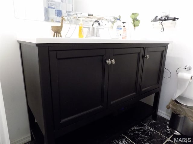 14875 County Road 2310, St James, MO 65559 - bathroom featuring baseboards and vanity