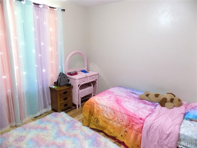 14875 County Road 2310, St James, MO 65559 - bedroom with wood finished floors