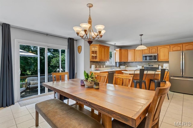 25 Saint Kathleen Ct, Troy, MO 63379 - dining area featuring light tile patterned flooring and a chandelier