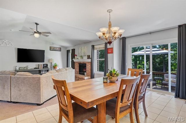 25 Saint Kathleen Ct, Troy, MO 63379 - dining area with light tile patterned floors, healthy amount of natural light, a chandelier, a ceiling fan, and lofted ceiling